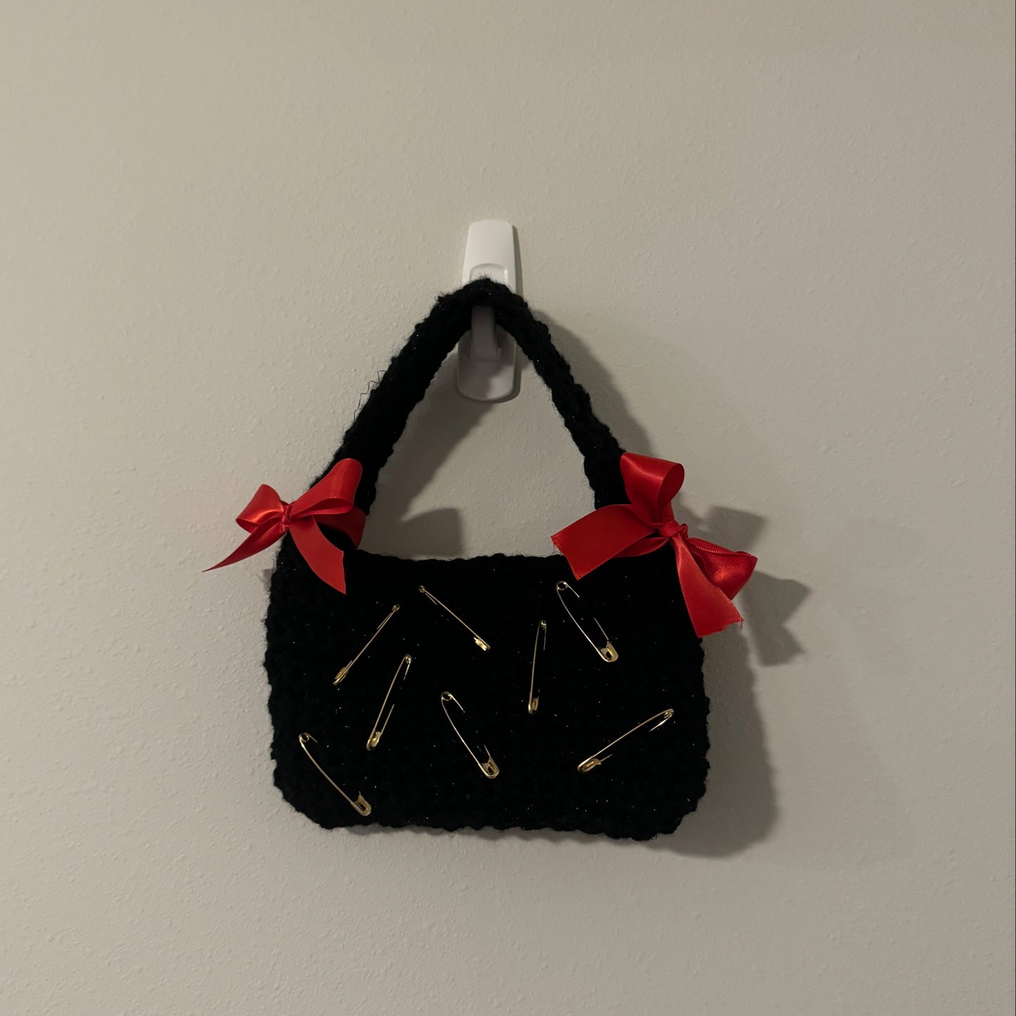 Accessorized black handbag
